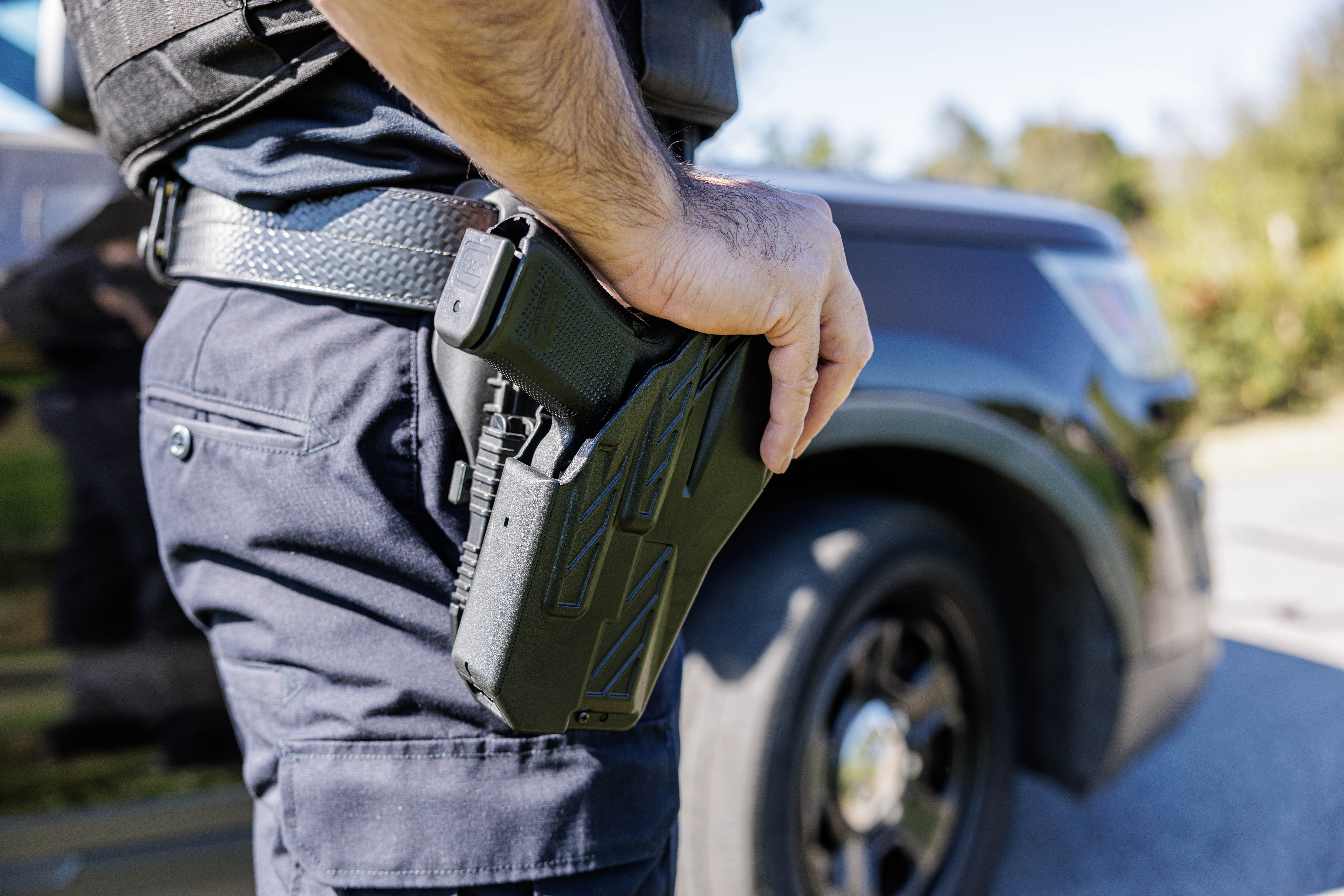 closeup of police officer wearing the MFT Guardian Duty Holster